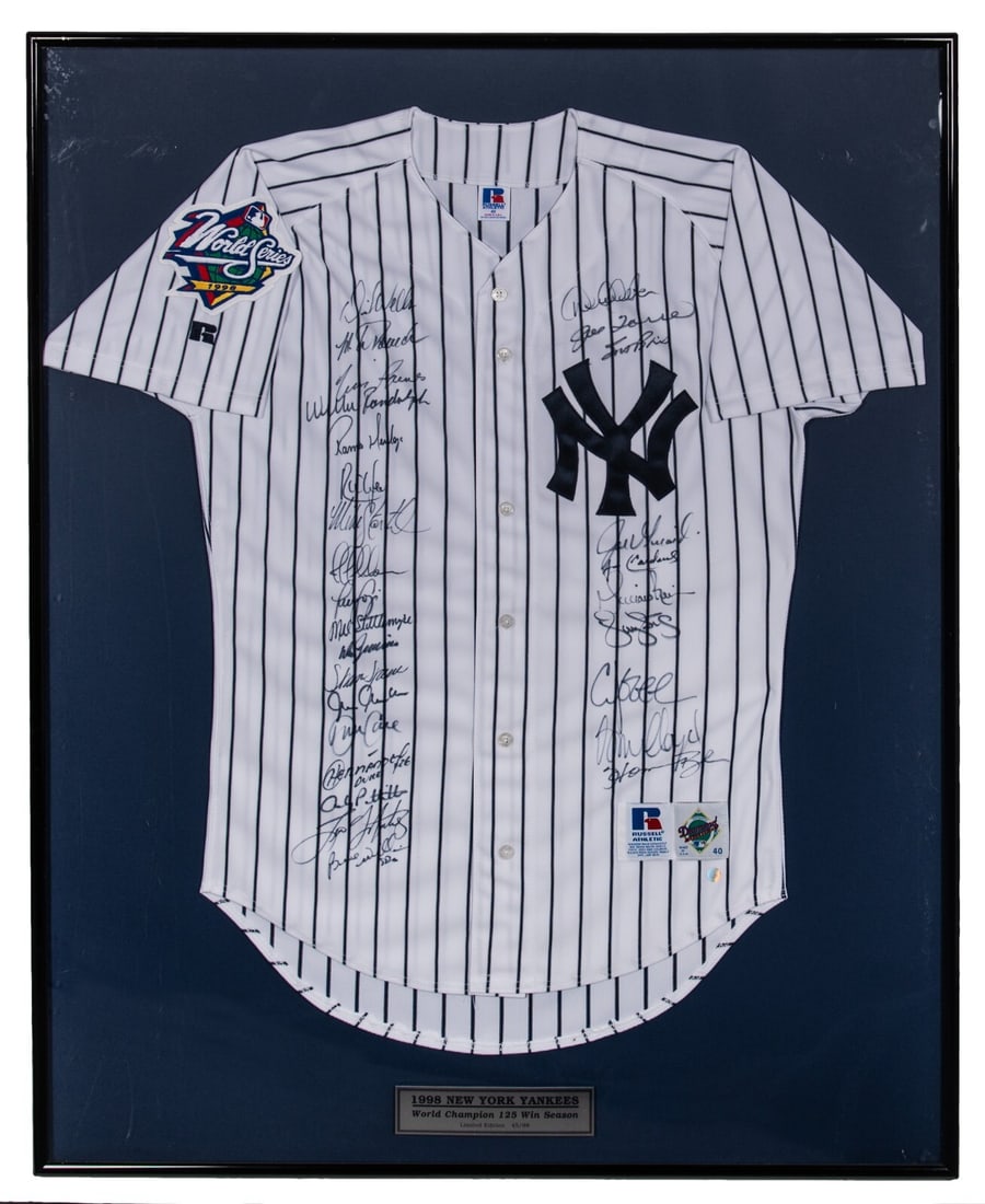1998 New York Yankees Team Signed Jersey Framed 32x40.5 PSA/DNA LOA: 1998 New York Yankees Team Signed Jersey Framed 32x40.5 PSA/DNA LOA Celebrate the extraordinary achievement of the 1998 New York Yankees with this team-signed World Series jersey, featuring the iconic
