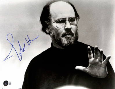 John Williams Signed 11x14 Star Wars Photo Beckett LOA: John Williams Signed 11x14 Star Wars Photo Beckett LOA This is an autographed 11x14 black and white photograph of renowned composer John Williams, signed in blue permanent marker. Williams is celebrat