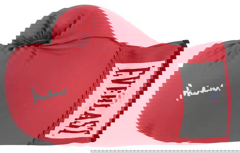 Muhammad Ali Signed Red Everlast Boxing Glove PSA/DNA Authenticated: Muhammad Ali Signed Red Everlast Boxing Glove PSA/DNA Authenticated Celebrate the legacy of boxing legend Muhammad Ali with this authentic signed red Everlast boxing glove. The glove features Ali's