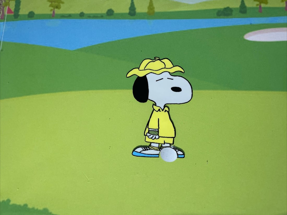 Snoopy Animation Cel 1975 Charles Schulz Art with COA: Snoopy Animation Cel 1975 Charles Schulz Art with COA This original hand-painted animation cel features the beloved character Snoopy from the classic animated short "You're a Good Sport, Charlie Brown