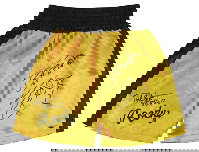 Rocky Signed Yellow Boxing Trunks by Stallone & Shire Beckett Authenticated: Rocky Signed Yellow Boxing Trunks by Stallone & Shire Beckett Authenticated Own a piece of cinematic history with these autographed yellow boxing trunks, personally signed by Sylvester Stallone and Ta