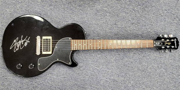 Signed Slash Fender Electric Guitar with Beckett COA: Signed Slash Fender Electric Guitar with Beckett COA This is an original Fender electric guitar signed by Slash, the legendary guitarist of Guns N' Roses. The guitar comes with a Beckett Authenticatio