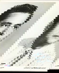 Johnny Cash Signed 8x10 B&W Photo PSA/DNA Authentic: Johnny Cash Signed 8x10 B&W Photo PSA/DNA Authentic This original black and white promotional photograph features the legendary Johnny Cash, personally signed by the artist himself. Measuring 8x10 inc
