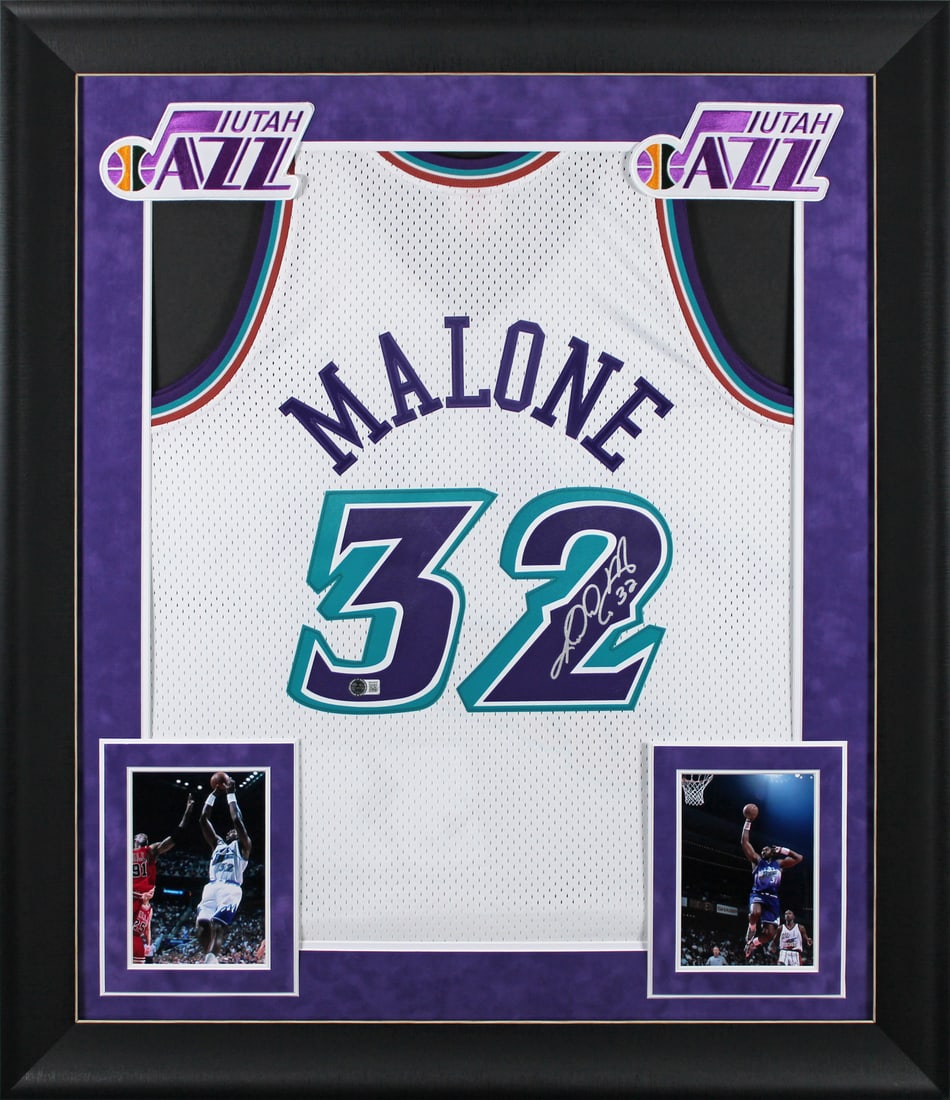 Karl Malone Signed 1996-97 Utah Jazz Framed Jersey BAS Certified: Karl Malone Signed 1996-97 Utah Jazz Framed Jersey BAS Certified This autographed 1996-97 White Mitchell & Ness Swingman jersey features the legendary Karl Malone of the Utah Jazz. Personally signed a