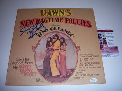 Tony Orlando Signed LP Album New Ragtime Follies JSA Certified: Tony Orlando Signed LP Album New Ragtime Follies JSA Certified This is an original signed LP record album of 'TONY ORLANDO DAWNS NEW RAGTIME FOLLIES'. The album features the signature of Tony Orlando,