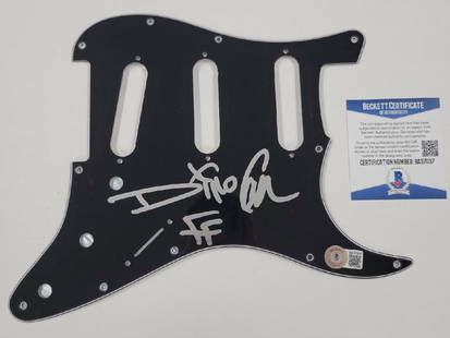 Dino Cazares Signed Black Electric Guitar Pickguard Fear Factory BAS COA: Dino Cazares Signed Black Electric Guitar Pickguard Fear Factory BAS COA This is an original black electric guitar pickguard signed by Dino Cazares, a notable member of the band Fear Factory. The pick