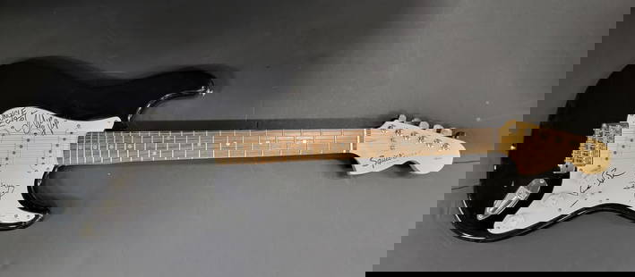 Alicia Keys Kevin Bacon Signed Electric Guitar JSA Authentication: Alicia Keys Kevin Bacon Signed Electric Guitar JSA Authentication This is an authentic electric guitar autographed by four renowned artists: Alicia Keys, Kevin Bacon, Vince Krackel, and Steve Segal. E