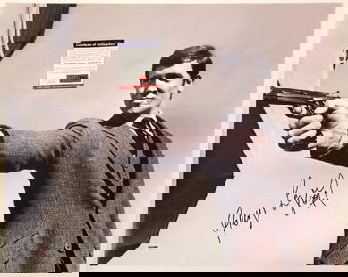 George Lazenby Signed 16x20 James Bond Photo PSA/DNA COA: George Lazenby Signed 16x20 James Bond Photo PSA/DNA COA This is an original 16x20 photograph of George Lazenby, famously known for his role as James Bond, signed by the actor himself. The autograph i