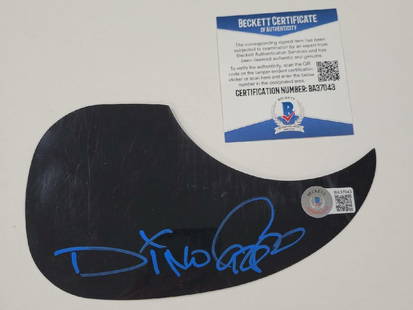 Dino Cazares Signed Blue Guitar Pickguard Fear Factory BAS COA: Dino Cazares Signed Blue Guitar Pickguard Fear Factory BAS COA This is an original guitar pickguard signed by Dino Cazares, known for his work with the band Fear Factory. The pickguard features a stri