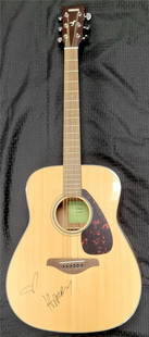Harry Styles Signed Acoustic Guitar on Body PSA/DNA Authenticated: Harry Styles Signed Acoustic Guitar on Body PSA/DNA Authenticated This rare acoustic guitar features a striking autograph from Harry Styles, located on the body of the instrument. The guitar is an ori