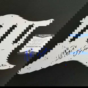 The Chainsmokers Signed Guitar Pickguard with Beckett COA: The Chainsmokers Signed Guitar Pickguard with Beckett COA This is an original signed guitar pickguard by Alex Pall and Andrew Taggart of The Chainsmokers. The item comes with a Beckett Certificate of