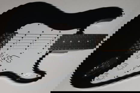 Tyga Autographed Guitar with JSA Authentication Rapper Hip Hop Collectible: Tyga Autographed Guitar with JSA Authentication Rapper Hip Hop Collectible This is an original guitar autographed by Tyga, the renowned rapper known for hits like "Rack City." The guitar comes with au