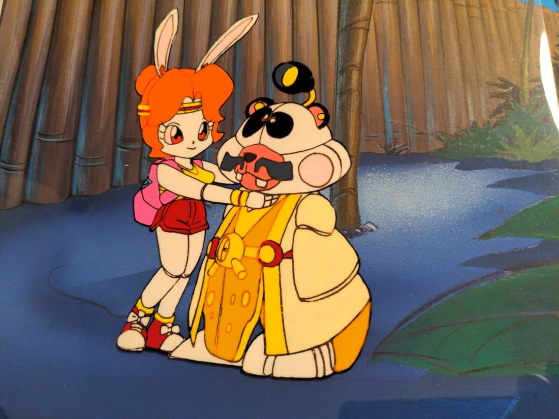 Original Samurai Pizza Cats Production Cel by Saban 1990 Anime Art: Original Samurai Pizza Cats Production Cel by Saban 1990 Anime Art This original production cel from the iconic anime series "Samurai Pizza Cats" features a beautifully hand-painted character on a det
