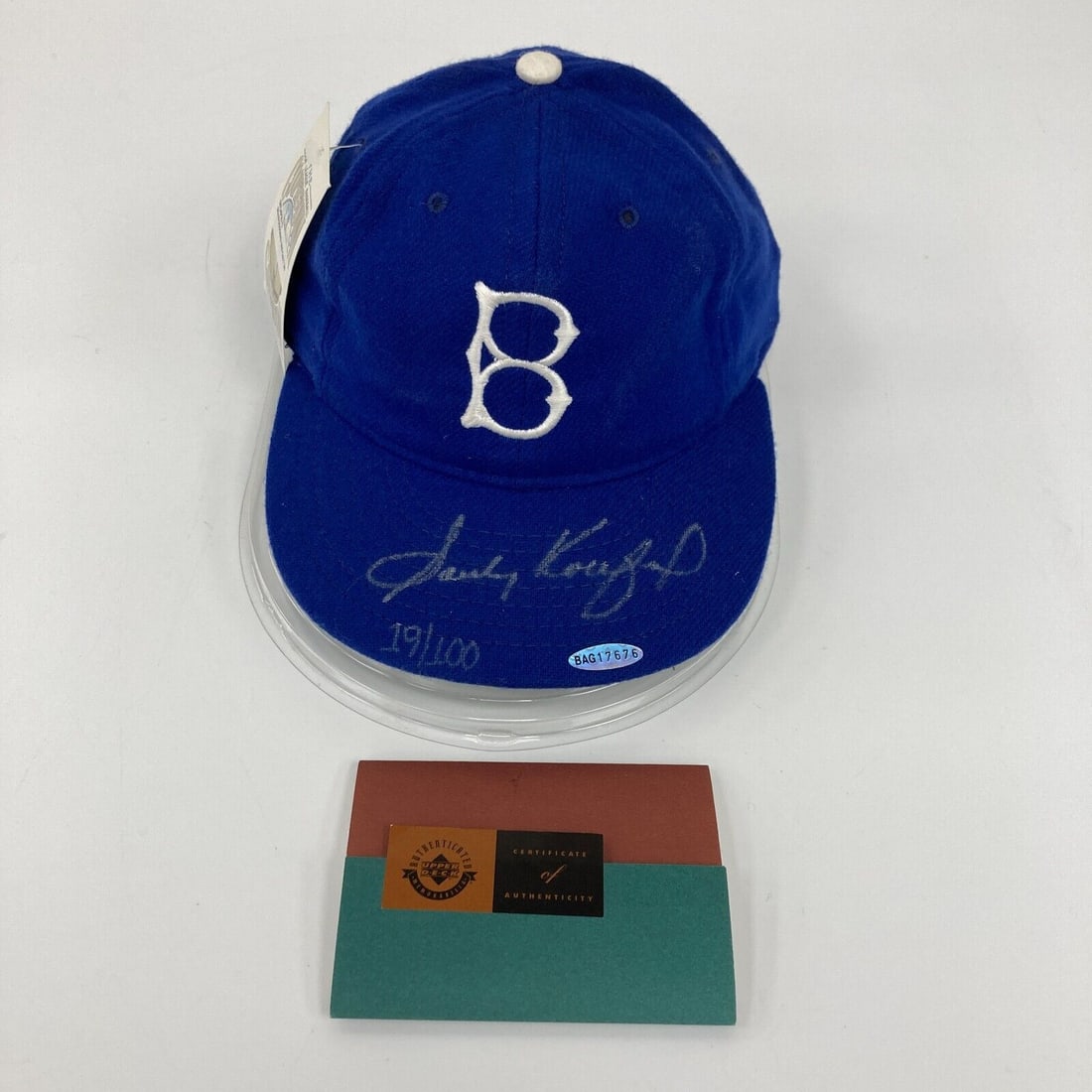 Sandy Koufax Signed Brooklyn Dodgers Hat UDA COA 19/100: Sandy Koufax Signed Brooklyn Dodgers Hat UDA COA 19/100 This is an original Brooklyn Dodgers game model hat signed by the legendary baseball player Sandy Koufax. The hat comes with an Upper Deck UDA C