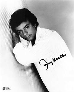 Johnny Mathis Signed 8x10 Photo BAS U97427 Autographed Music Memorabilia: Johnny Mathis Signed 8x10 Photo BAS U97427 Autographed Music Memorabilia This stunning 8x10 photograph features the autograph of legendary singer-songwriter Johnny Mathis, signed in black Sharpie. The