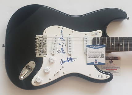 Sean Lennon Charlotte Kempnuhl Signed Electric Guitar Beckett Authenticated: Sean Lennon Charlotte Kempnuhl Signed Electric Guitar Beckett Authenticated This is an autographed electric guitar signed by renowned musician Sean Lennon and Charlotte Kempnuhl. The guitar comes with