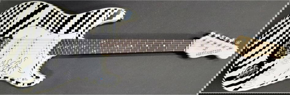 Mod Sun Autographed Electric Guitar with Beckett Authentication: Mod Sun Autographed Electric Guitar with Beckett Authentication This is a pre-owned electric guitar autographed by singer-songwriter Mod Sun, offering a unique piece for music enthusiasts and collecto