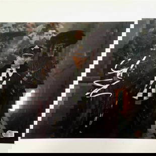 Ed Skrein Autographed 11x14 Rebel Moon Photo Beckett Certified: Ed Skrein Autographed 11x14 Rebel Moon Photo Beckett Certified This is an original 11x14 photograph signed by Ed Skrein from the film Rebel Moon. The autograph has been authenticated by Beckett, ensur