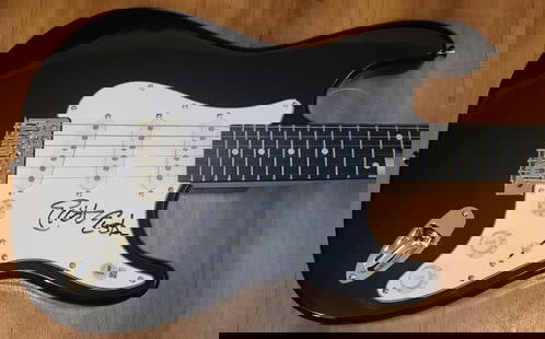 Elliot Easton Signed Electric Guitar The Cars Beckett Authenticated: Elliot Easton Signed Electric Guitar The Cars Beckett Authenticated This is an original electric guitar signed by Elliot Easton, renowned guitarist of the band The Cars. The guitar comes with a Becket