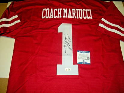 Steve Mariucci Signed Adidas Jersey Beckett Authenticated NFL Collectible: Steve Mariucci Signed Adidas Jersey Beckett Authenticated NFL Collectible This officially licensed Adidas jersey features the signature of Steve Mariucci, a notable figure in NFL history. The jersey i