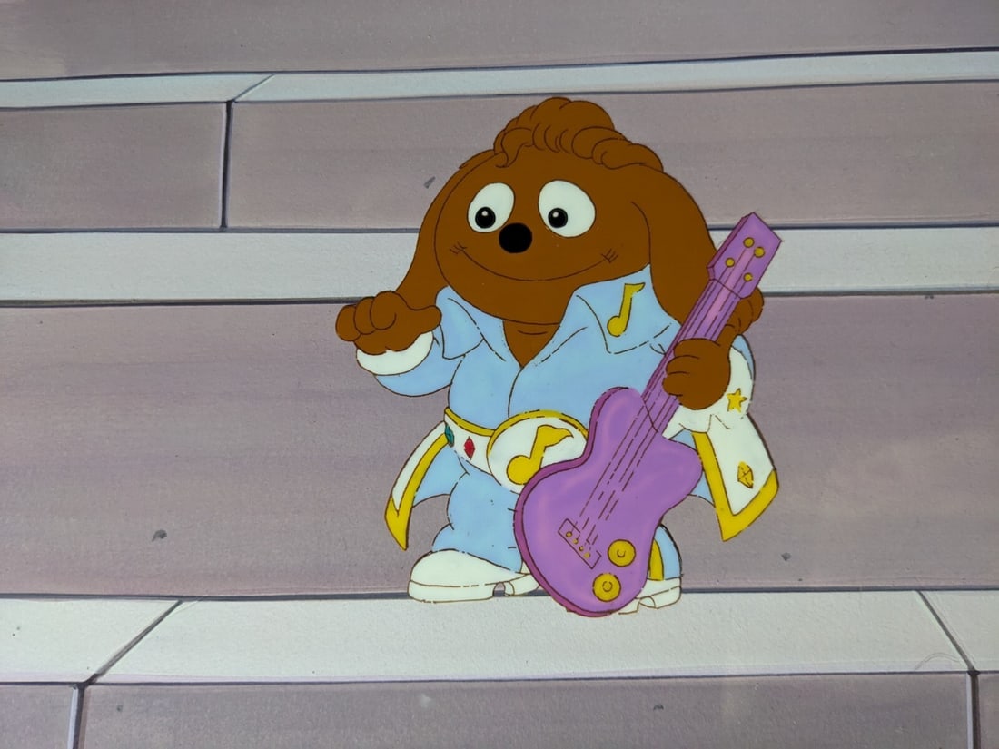 Vintage Muppet Babies Animation Cel by Jim Henson Featuring Iconic Characters: Vintage Muppet Babies Animation Cel by Jim Henson Featuring Iconic Characters This captivating vintage animation cel from the beloved series 'Muppet Babies' features iconic characters including Gonzo,