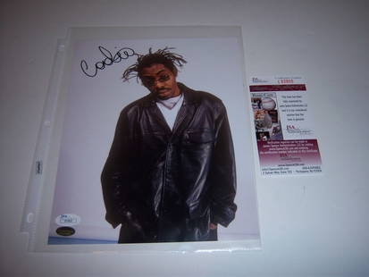 Coolio Signed 8x10 Photo JSA COA Authentic Rapper Memorabilia: Coolio Signed 8x10 Photo JSA COA Authentic Rapper Memorabilia This is a signed 8x10 photo of Coolio, the famous rapper who is no longer with us. The photo is authenticated with a JSA/COA, ensuring its