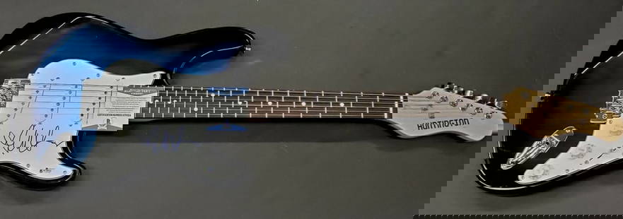 Juliet Lewis Signed Electric Guitar with Beckett Authentication: Juliet Lewis Signed Electric Guitar with Beckett Authentication This is an authentic autographed electric guitar signed by Juliet Lewis, a renowned figure in the music industry. The guitar comes with