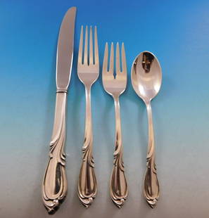 International Sterling Silver Rhapsody Flatware Set for 12 - 51 Pieces: International Sterling Silver Rhapsody Flatware Set for 12 - 51 Pieces Presenting the Rhapsody by International Sterling Silver Flatware Service for 12, an exquisite collection that enhances any dinin