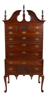 Elegant Statton Cherry Highboy Chest with Shell-Carved Drawers: Elegant Statton Cherry Highboy Chest with Shell-Carved Drawers This elegant New England Style Cherry Highboy Chest is approximately 35 years old and showcases a traditional design with a beautiful Old