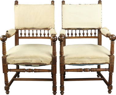 Elegant Set of 1890 French Walnut Armchairs Henry II Style: Elegant Set of 1890 French Walnut Armchairs Henry II Style This exquisite set of two armchairs, crafted in the Henry II style, showcases the elegance of 1890s French design. Made from rich walnut, the
