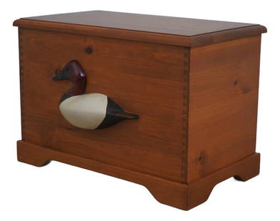 Vintage Pine Dovetailed Blanket Chest with Decoy Duck: Vintage Pine Dovetailed Blanket Chest with Decoy Duck This is a Pine Dovetailed Blanket Chest featuring a Decoy Duck mounted on the front. The chest has a lift-top design and is approximately 30 years