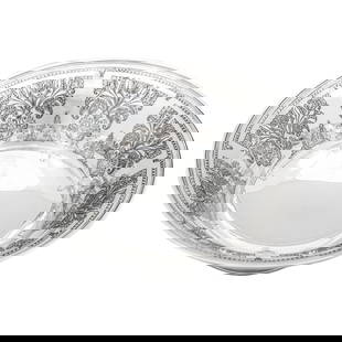Sterling Silver Bowl: Sterling Silver Bowl This exquisite sterling silver bowl by Tiffany & Company features a stunning etched floral design that remains pristine and vibrant. Crafted in the 1930s, this bowl showcases beau