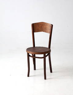 1930s Great Northern Bentwood Chair Art Deco Design: 1930s Great Northern Bentwood Chair Art Deco Design This antique bentwood chair from the Great Northern Chair Company, dating back to the 1930s, showcases an Art Deco arched back and a pressed leather