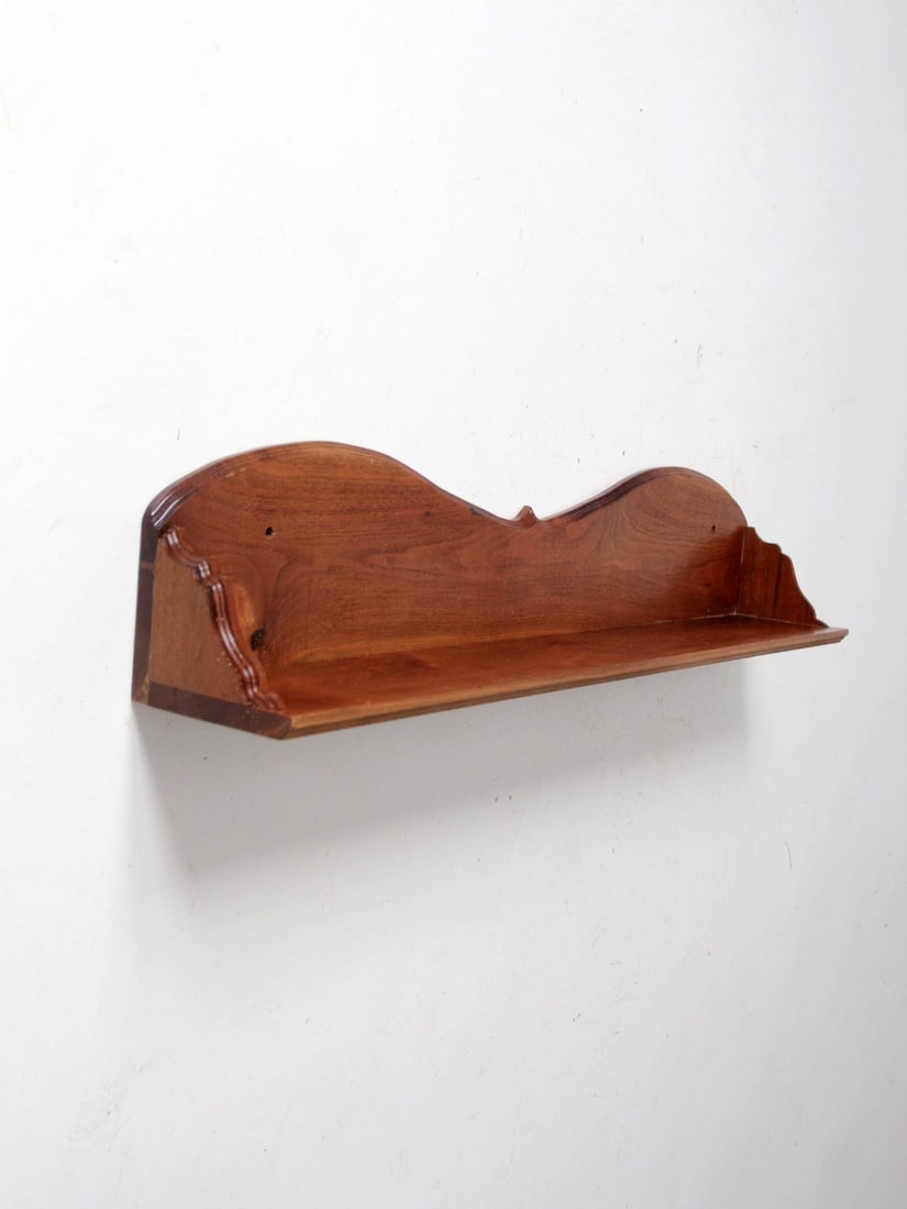 Vintage Scalloped Wooden Mantel Shelf 41 x 6.75 x 8.5: Vintage Scalloped Wooden Mantel Shelf 41 x 6.75 x 8.5 This antique wooden mantel shelf showcases a beautifully scalloped back design and sides, making it an elegant addition to any room. It can be use
