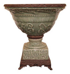 Elegant Green Porcelain Center Planter Bowl 12"w x 12"d x 12"h: Elegant Green Porcelain Center Planter Bowl 12"w x 12"d x 12"h This elegant Green & Bronze Porcelain Center Planter Bowl showcases exquisite craftsmanship and a beautiful green glazed finish. With a s