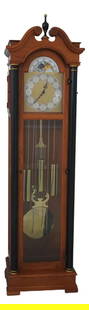 Colonial Empire Walnut Grandfather Clock with Black Columns: Colonial Empire Walnut Grandfather Clock with Black Columns This stunning Colonial Empire Style Grandfather Clock showcases a beautiful walnut construction with a natural walnut finish. The clock feat