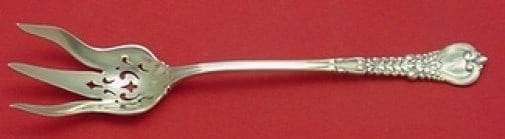 Tiffany & Co. Florentine Sterling Silver Lettuce Fork 8 1/4": Tiffany & Co. Florentine Sterling Silver Lettuce Fork 8 1/4" Discover the elegance of the Florentine pattern with this exquisite Sterling Silver Lettuce Fork by Tiffany & Co. Crafted between 1900 and