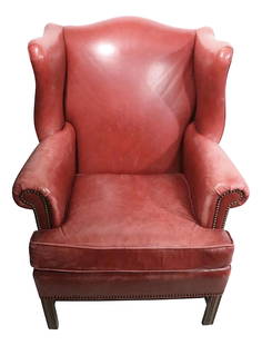 1990s Ethan Allen Classic Leather Wingback Chair with Brass Nailheads: 1990s Ethan Allen Classic Leather Wingback Chair with Brass Nailheads This 1990s Classic Leather Wing Chair, crafted by renowned American furniture maker Ethan Allen, showcases a timeless design with