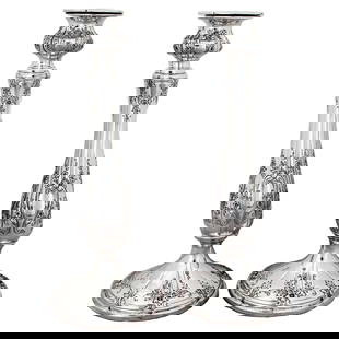 Sterling Silver Candlesticks Set of 2: Sterling Silver Candlesticks Set of 2 This exquisite set of two sterling silver candlesticks stands 12 inches tall, showcasing a lovely silhouette adorned with intricately designed garlands and flower
