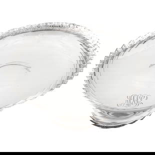 Sterling Silver Footed Bowl with Floral Motif: Sterling Silver Footed Bowl with Floral Motif Being offered is a sterling silver footed-bowl by the world renowned Tiffany and Co. There is a floral motif around the base of the pedestal and again aro