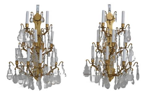 Elegant 1930s Vintage Brass & Crystal 9 Arm Wall Sconces: Elegant 1930s Vintage Brass & Crystal 9 Arm Wall Sconces This elegant pair of vintage wall sconces features a stunning design from the 1930s, crafted from solid brass with beautifully curved and detai