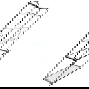 Hollywood Regency Chrome Vitrine with Glass Shelves 33.75x17.25x80: Hollywood Regency Chrome Vitrine with Glass Shelves 33.75x17.25x80 Chrome and glass vitrine in the Hollywood Regency style. This interesting etagere has a wider lower section with two large glass shel