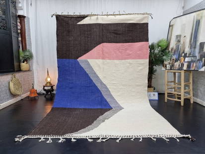 Authentic Moroccan Berber Wool Area Rug 9.84 x 6.56 Feet: Authentic Moroccan Berber Wool Area Rug 9.84 x 6.56 Feet Enhance your living space with this stunning authentic handmade Moroccan Berber wool area rug. This vibrant rug is meticulously handwoven by lo