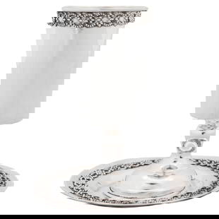Sterling Silver Goblet and Plate Set of 2: Sterling Silver Goblet and Plate Set of 2 This exquisite Sterling Silver Kiddush Set features a beautifully crafted goblet and plate, perfect for ceremonial occasions. The set showcases a decorative p