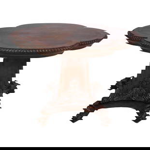 Maitland Smith Flame Mahogany Figural Center Table 52 x 40 x 34: Maitland Smith Flame Mahogany Figural Center Table 52 x 40 x 34 This exquisite Maitland Smith center table features a stunning flame mahogany top with a beautifully carved scalloped edge. With its ric