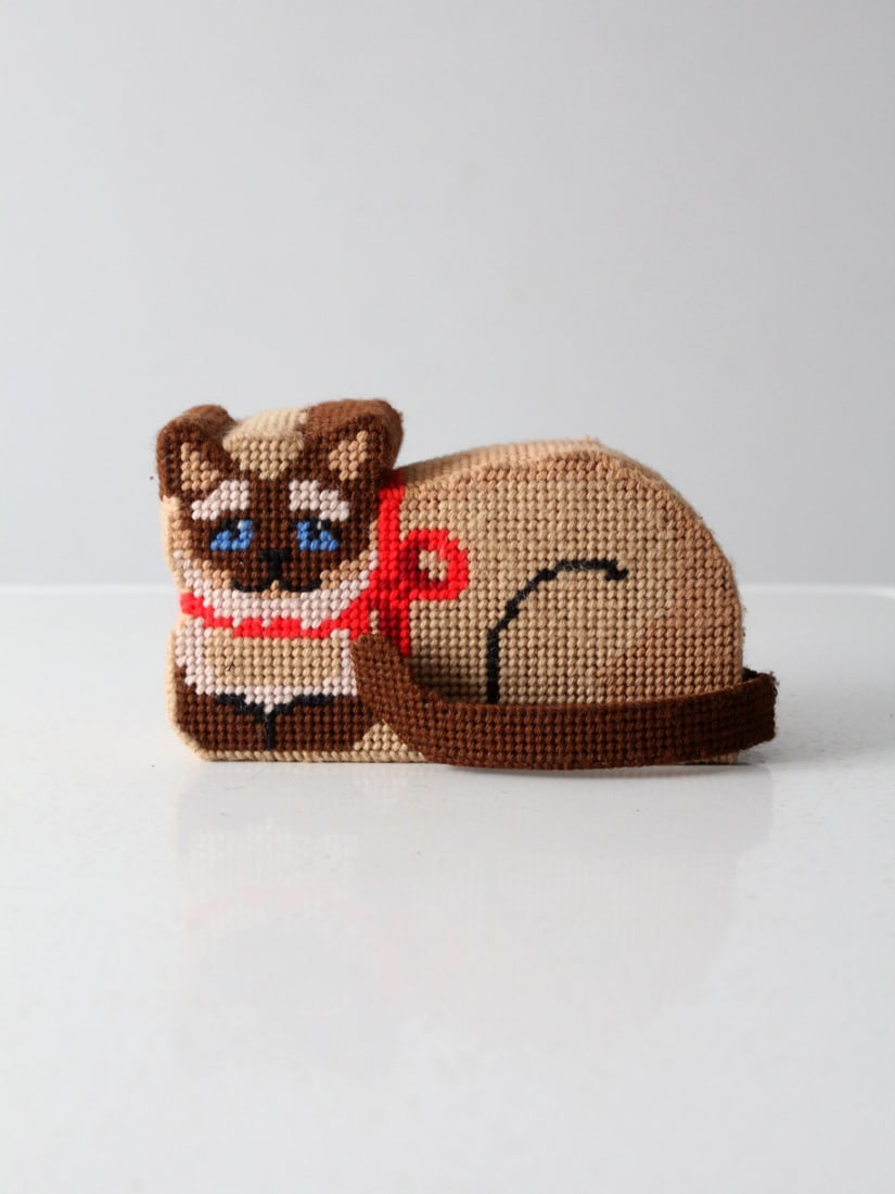 Charming Vintage Needlepoint Siamese Cat Doorstop with Red Scarf: Charming Vintage Needlepoint Siamese Cat Doorstop with Red Scarf This vintage needlepoint doorstop features a delightful Siamese cat design, expertly handcrafted with intricate needlepoint work that s