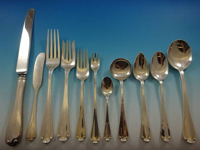 Tiffany & Co Flemish Sterling Silver 92 Piece Flatware Set with Storage Chest: Tiffany & Co Flemish Sterling Silver 92 Piece Flatware Set with Storage Chest Discover the elegance of the Flemish pattern by Tiffany & Co., a sterling silver flatware set designed to enhance your din