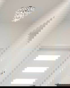 Living District Ella 12 inch Chrome Crystal Flush Mount Chandelier 3 Light: Living District Ella 12 inch Chrome Crystal Flush Mount Chandelier 3 Light Illuminate your space with this stunning 12" Crystal Flush Mount Chandelier. Featuring a polished chrome finish and adorned w