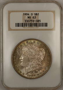 1904-O Morgan Silver Dollar NGC MS63 Uncirculated Toned Coin: 1904-O Morgan Silver Dollar NGC MS63 Uncirculated Toned Coin This 1904-O Morgan Silver Dollar is a stunning example of American coinage, graded MS 63 by NGC, showcasing its uncirculated condition. Min