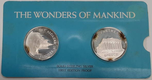 1972 Franklin Mint Wonders Mankind Silver Medal Set 0.925: 1972 Franklin Mint Wonders Mankind Silver Medal Set 0.925 This exquisite 1972 Wonders/Mankind Silver 2 Medal Set from Franklin Mint showcases the beauty of silver craftsmanship. Both medals in the set